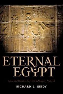 Eternal Egypt by Richard J. Reidy featuring a Egyptian wall carving on a black background.